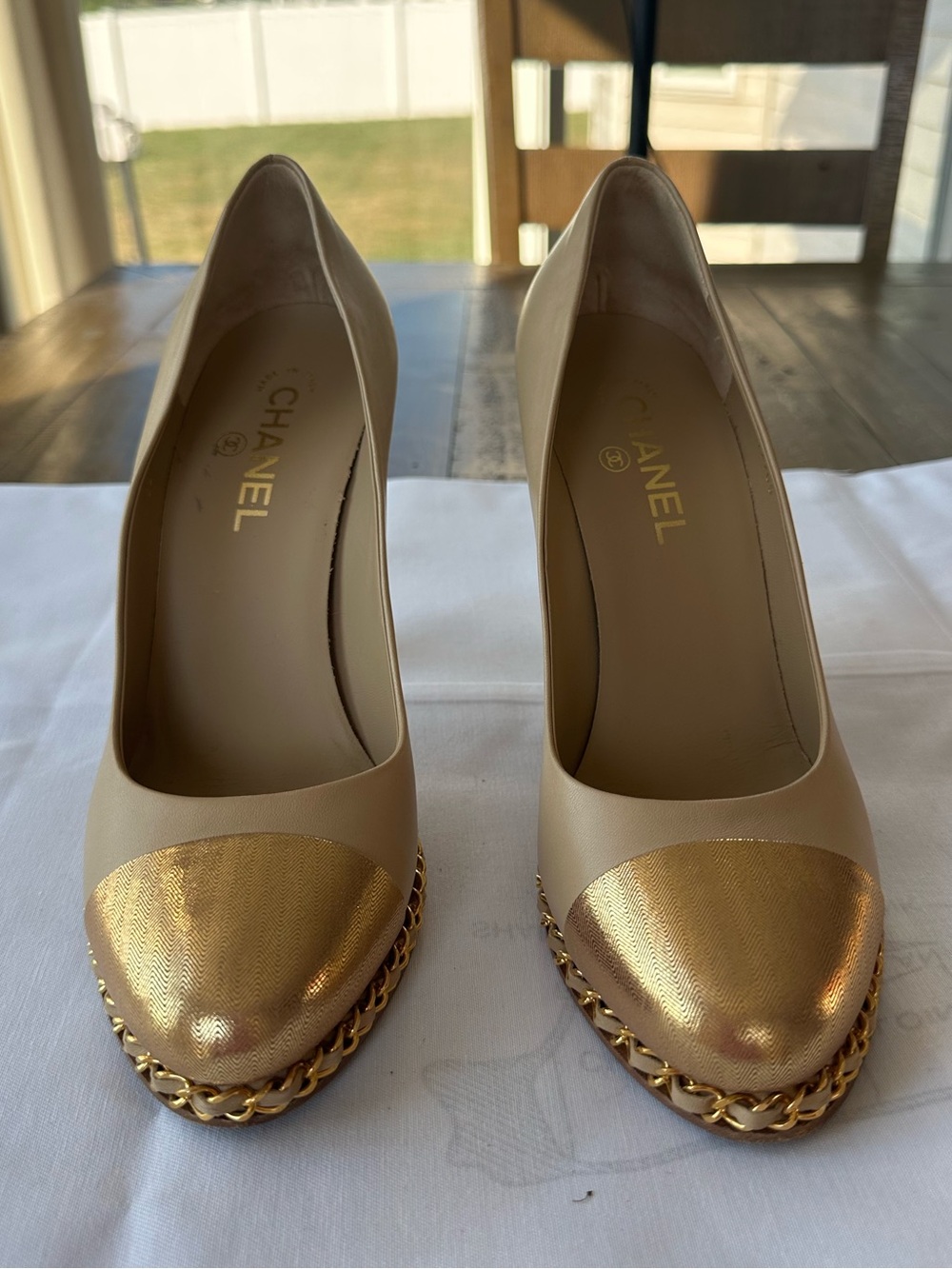 Chanel Vintage 2011 beige leather cap toe gold chain pumps